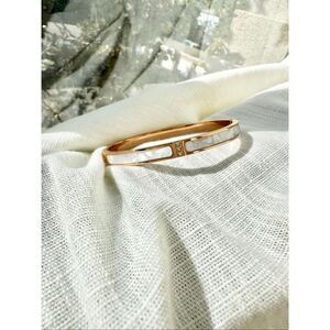 Elegant Gold and White Bracelet